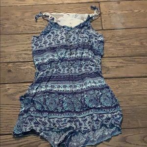 Blue patterned romper with lace back
